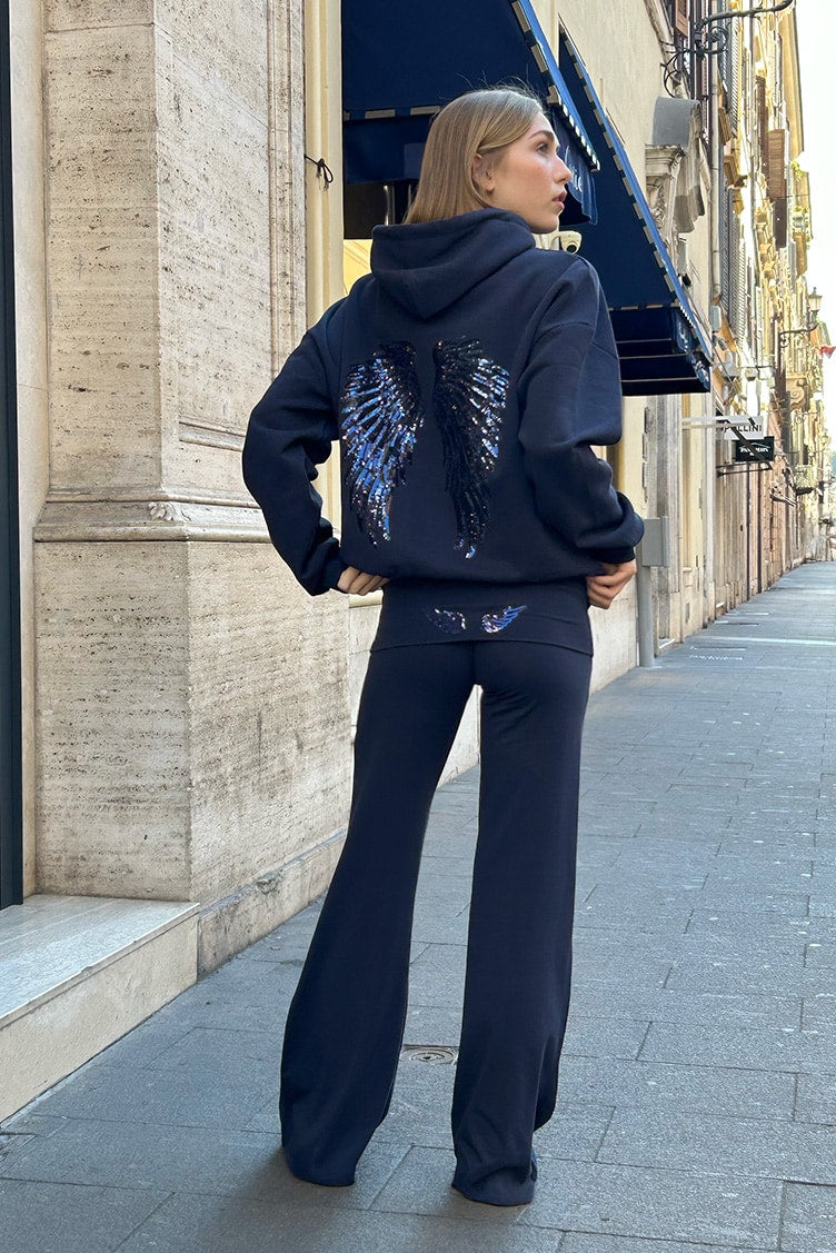 Completo: felpa + pantaloni “Ali scintillanti”